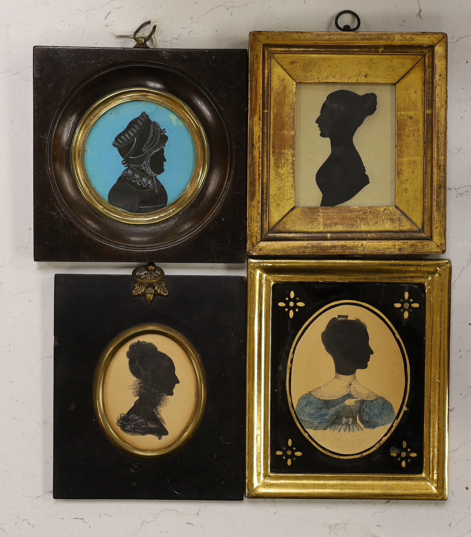 Four framed 19th century silhouettes